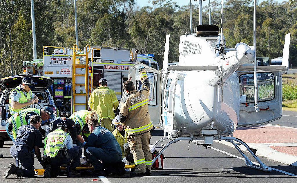 Emergency crews treated a motorbike rider at a crash on the Bruce Hwy, but he later died in hospital. Emergency crews treated a motorbike rider at a crash on the Bruce Hwy, but he later died in hospital.